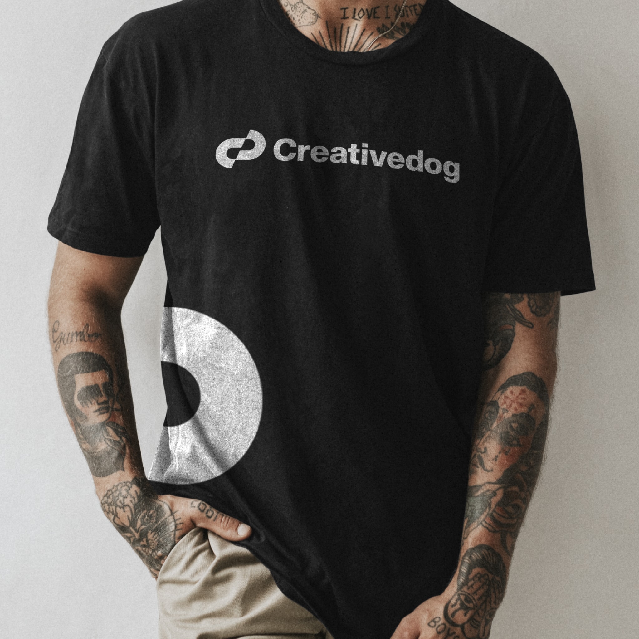 The Creativedog logo on a black t-shirt