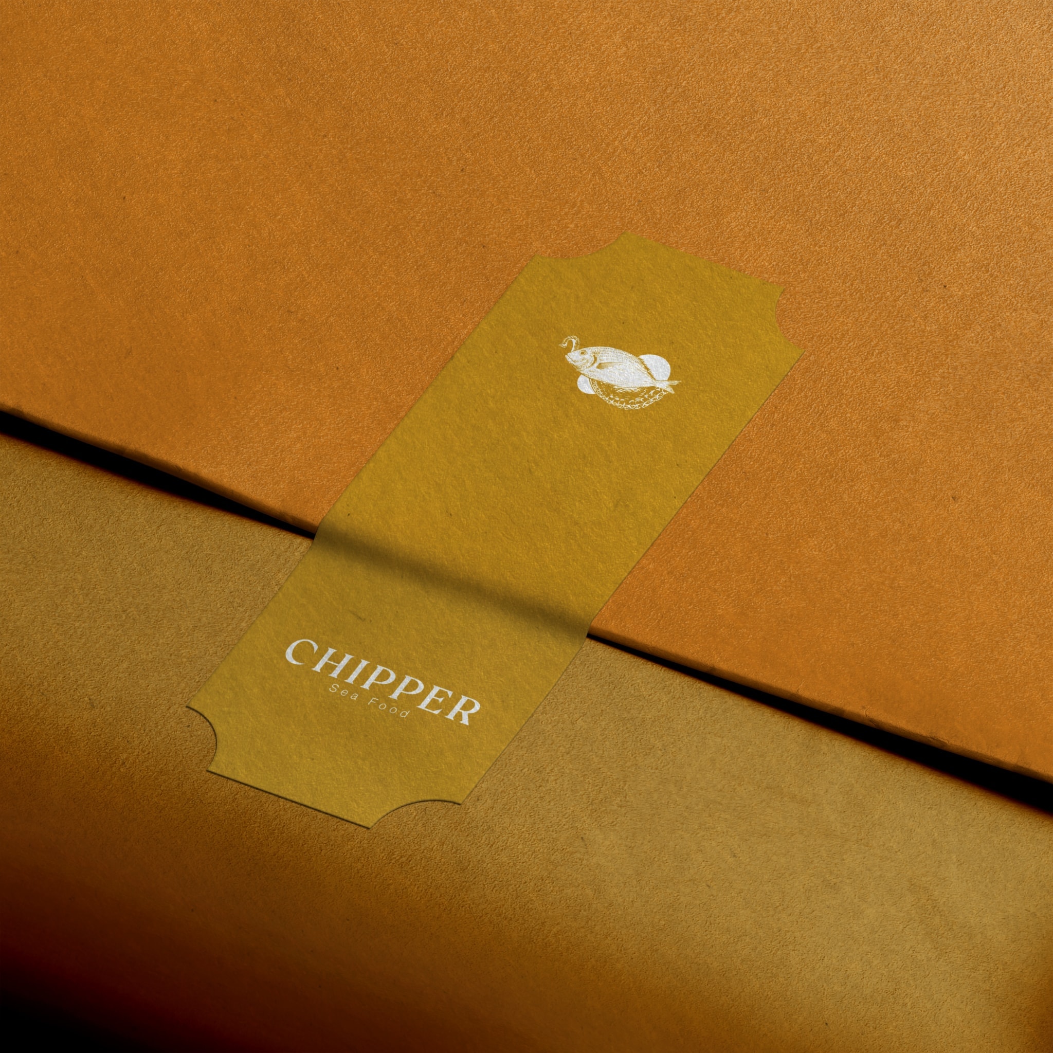 A mustard label with the mark on a kraft paper package
